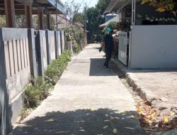 Jalan Rabat Beton Desa Cikutamahi Kini Mulus