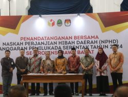 Bupati Iwan Setiawan Teken Naskah Perjanjian Hibah Daerah Anggaran Pemilukada Serentak 2024