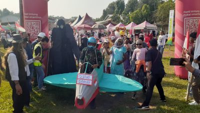 Ribuan Warga RW 02 Desa Pondok Udik Ramaikan Pawai HUT RI Ke-79